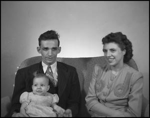 [William and Esther Krent with their daughter, 8]