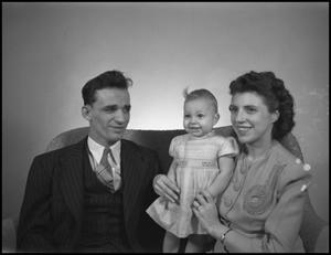 [William and Esther Krent with their daughter, 4]
