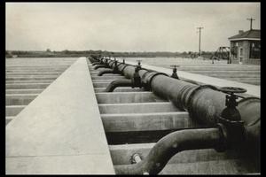 [Photograph of pipes at a water or gas plant, 2]