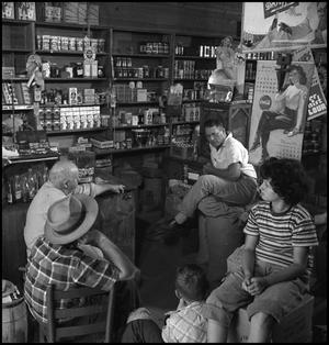 [Man speaking in a store, 2]