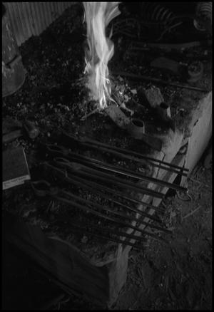 [Photograph of a lit forge, 1]