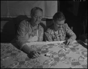 [Aunt Nora and Viola Treece quilting]