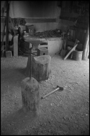 [Photograph of a workroom with a forge, 1]