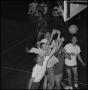 Thumbnail image of item number 1 in: '[7 men jumping for a basketball]'.
