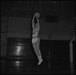 [Bill Cutter jumping up with basketball, 2]