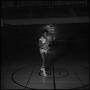 Photograph: [John Moody with a basketball]
