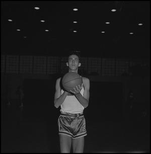 Primary view of object titled '[Zack Hayes holding a basketball, 3]'.