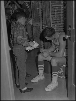 [1967 basketball player signing autograph]