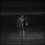 Primary view of [Basketball player dribbling back and forth]