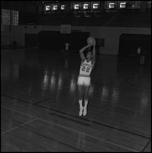[Crest Whitaker jumping with a basketball, 2]