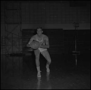 [Bill Cutter holding a basketball, 2]