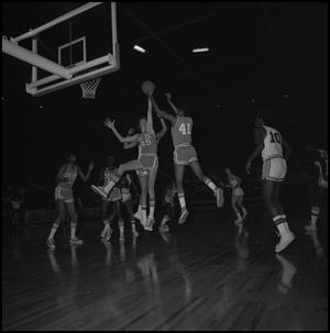[North Texas Eagles vs Drake in Basketball Game at the Coliseum]