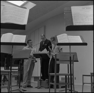 [Maurice McAdow with two music students]