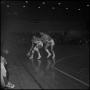 Primary view of [Basketball player dribbling a basketball]
