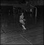 Photograph: [Bill Cutter running with basketball, 2]