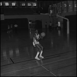 [Leroy Winfield preparing to shoot a basketball]