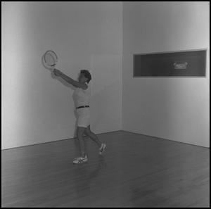 [Woman playing racquetball]