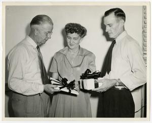 [Fowler, Babb, and Hannah with gifts]