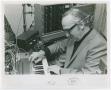 Photograph: [Merrill Ellis at the synthesizer in the NTSU Electronic Music Center…