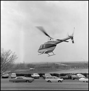 [Helicopter leaving landing site]