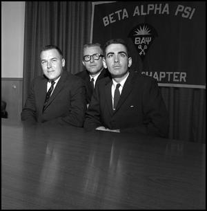 [Three Beta Alpha Psi inductees from side]
