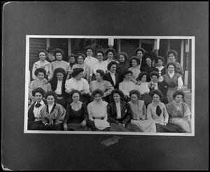 [Women on lawn of boarding house in Denton]