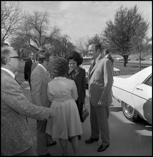 [Governor Dolph Briscoe being greeted at car]