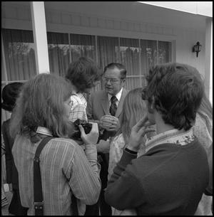 [Gov. Dolph Briscoe speaking to reporters at reception]