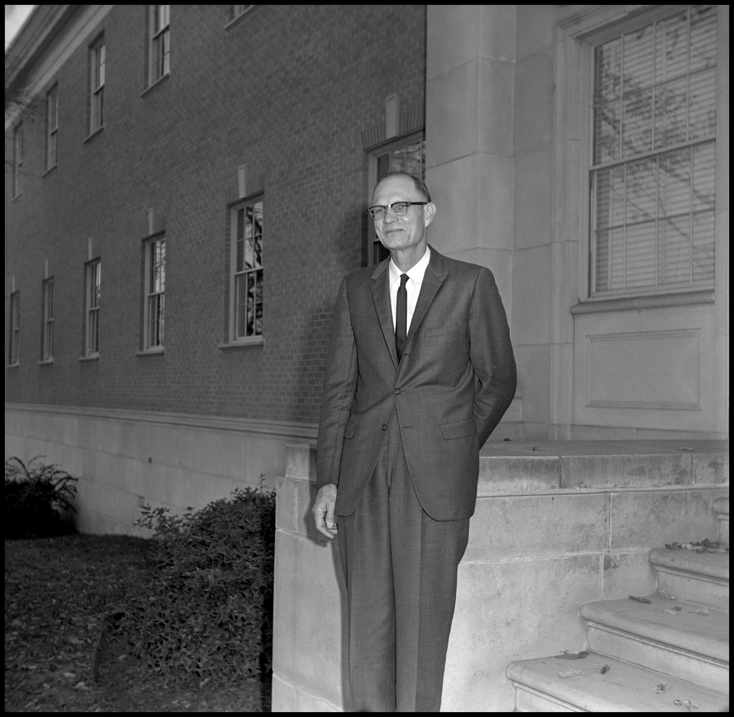 [Dr. Earle Blanton standing at bottom of steps]
                                                
                                                    [Sequence #]: 1 of 1
                                                