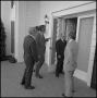 Photograph: [Attendees entering C. C. Nolen's home for reception]