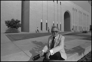 [A. M. Willis outside of Willis library]