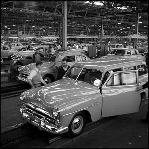 [Automobiles in a factory, 8]