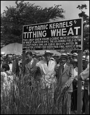 [Three men standing underneath the "Dynamic Kernels" sign]