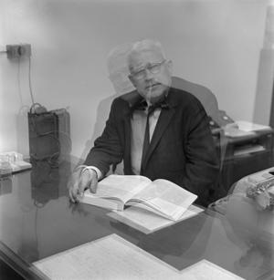 [Dr. J. L. Carrico at his desk, 3]