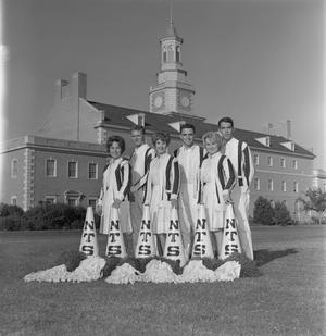 [Six cheerleaders in front of the Hurley Administration Building, 2]