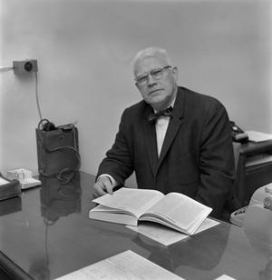 [Dr. J. L. Carrico at his desk, 4]