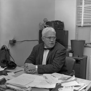 [Dr. J. L. Carrico at his desk, 2]