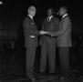 Primary view of [Dr. Jess E. Cearley giving awards to B. J. Cristle & B. Smith, 2]