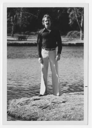 [Bill Nelson standing next to water]