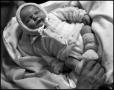 Photograph: [Baby Junebug laying in a blanket]