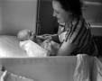 Photograph: [Bernice drying baby Junebug]