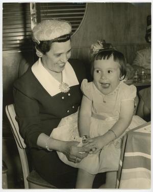 Primary view of object titled '[Mary Louise on her mothers lap]'.