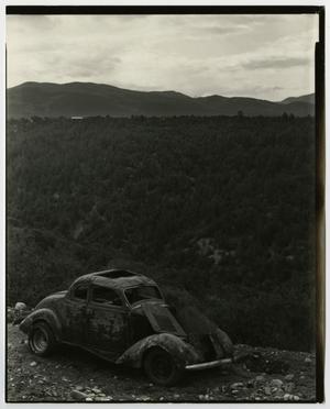 [Photograph of an old vehicle]