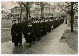 [Photograph of students during commencement]