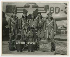 [Frank Cuellar Jr. and military group in front of airplane]