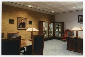 [Display case and desk in reading room]