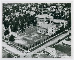[Aerial photograph of the campus with the Power Plant, Library, the Science Building, and the Mail Building]