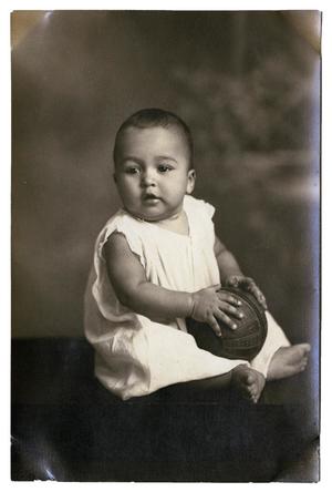 [Portrait of Raymond Flores with ball]