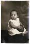Photograph: [Portrait of Raymond Flores with ball]