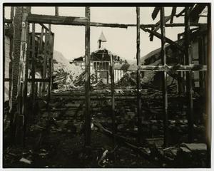 [Photograph of a fire aftermath]